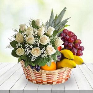 Send Gifts to Jalandhar 14 Stunning Basket of White Roses N Fruits